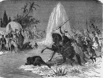 Freude der Araber beim Anblick des Wasserflusses aus dem artesischen Brunnen von Sidi-Rached, geschmiedet von den Franzosen, in der Sahara-Wüste. In 