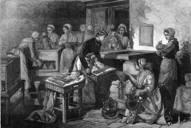 Hebamme, Krankenschwestern und Brutkästen: Die Ausstattung des Entbindungsheims zur Erhaltung des Lebens von Frühgeborenen in Paris. Gravur in „Le Monde Illustré“.