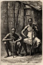 Porträt von zwei Bakali-Kriegern. Zeichnung von H. Castelli, zur Illustration der Reise nach Gabun in den Jahren 1861-1864 von Dr. Griffon du Bellay. Gravur in „Le tour du monde“, herausgegeben von Edouard Charton