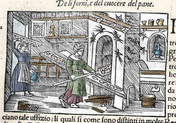 Vorbereitung und Backen von Brot in einem Ofen. Gravur von Olaus Magnus (1490-1557), schwedischer Geistlicher und Geograph, „Historia de Gentis Septentrionalibus“, Venedig