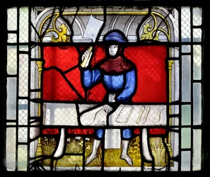 Buntglasfenster, das einen Metzger bei der Arbeit zeigt, Ende des 15. - Anfang des 16. Jahrhunderts - Chapelle Sainte Claude der Kirche Notre-Dame de Semur-en-Auxois, Burgund