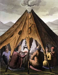 Sami: Ureinwohner der nördlichen Länder (Norwegen, Finnland, Schweden und Russland) versammeln sich um ein Feuer unter einem Zelt