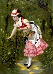 Junge Frau pflückt Blumen