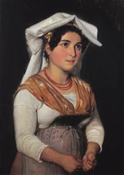 Eine junge, stehende italienische Frau, die einen Rosenkranz hält