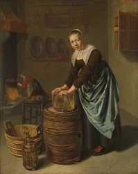 Frau, die ein Gefäß scheuert