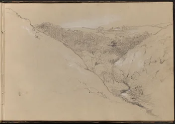 Landschaft mit Hügeln und Wald
