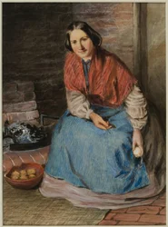 Frau schält Äpfel