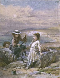 Zwei Mädchen und ein Junge mit Seetang