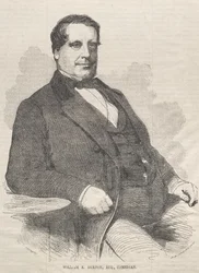 William E. Burton, Esq., Komiker