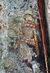 Männliche Figur mit Kopfbedeckung, beschädigtes Fresko in der Kirche von Metamorphosis Sotiros, Voutas, Kreta, Griechenland (Foto)